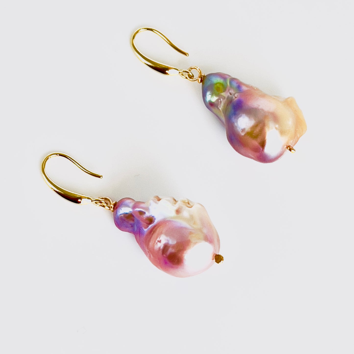 Genuine Freshwater Pink - Purple Baroque Flameball Pearl Earrings
Stunning , Unique. Unforgettable !